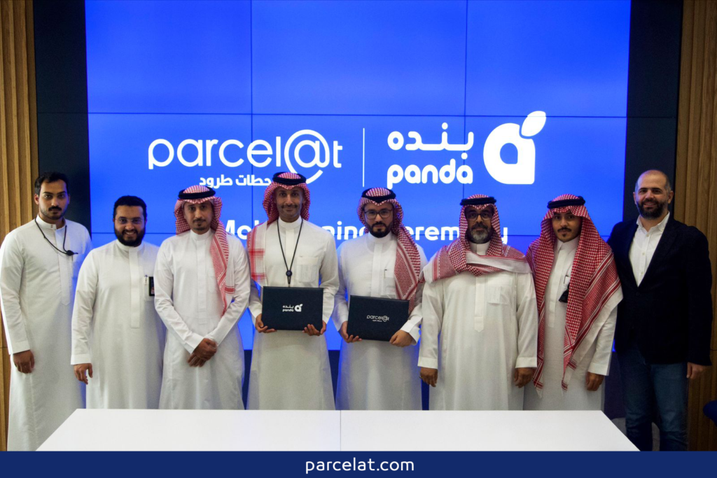 Group photo of Parcelat and Panda teams at MoU ceremony.